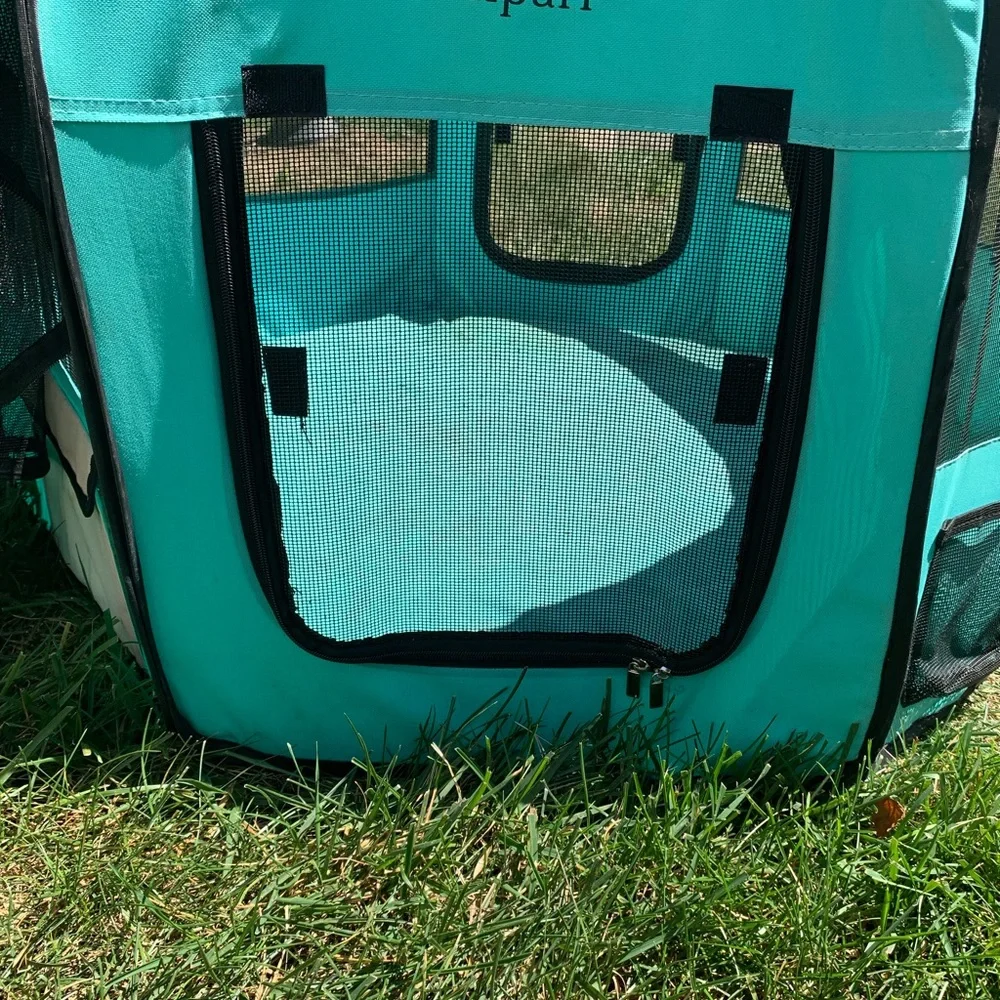 Used Aliparr animal safe zone with zipper top. It had some wear needs cleaned.